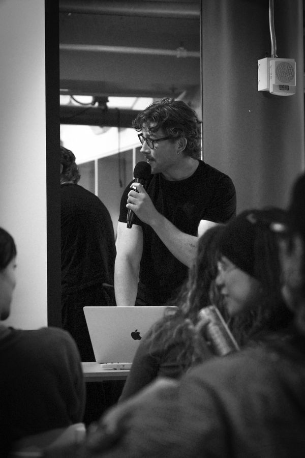 man holding microphone talking